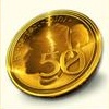 Kleeblatt und Goldmünze